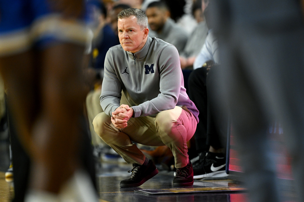 FILE - Michigan head coach Dusty May watches his team play UCLA in the first half of an NCAA college basketball game in Ann Arbor, Mich., Saturday, Feb. 14, 2026. (AP Photo/Lon Horwedel, File)