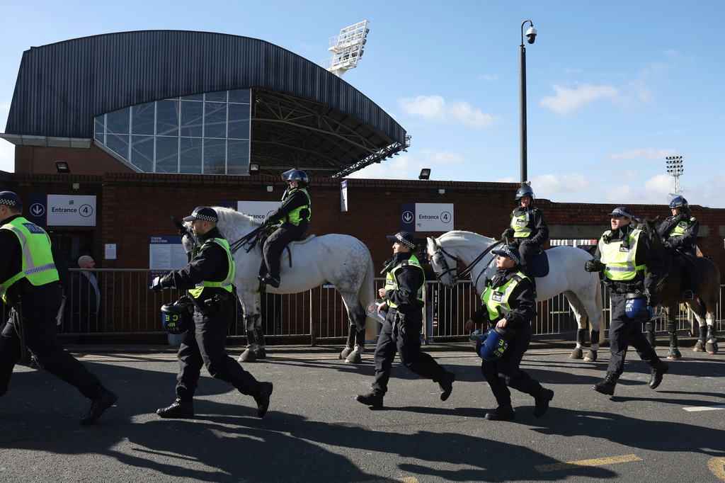FILE - Mounted police patrols the streets around the stadium ahead of the English FA Cup soccer match between Crystal Palace and Millwall at Selhurst Park, London, England, Saturday, March 1, 2025. (AP Photo/Ian Walton, file)
