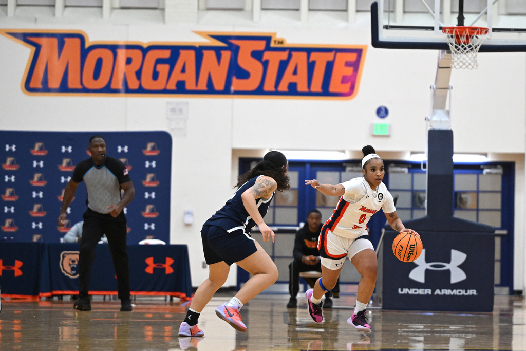 Morgan State guard Mihjae Hayes (2) drives against Washington Adventist University during an NCAA college basketball game, Wednesday, Nov 12, 2025, in Baltimore. (AP Photo/Gail Burton)