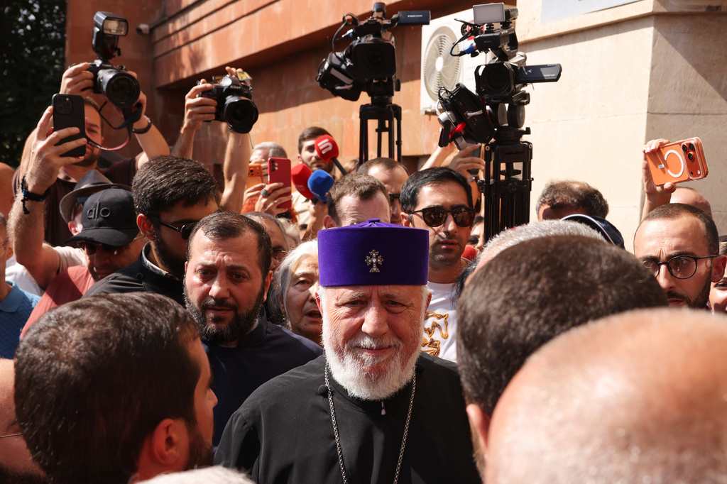 The head of the Armenian Apostolic Church Catholicos Karekin II, center, arrives at the Armavir Court of First Instance in Vagharshapat, Armenia, Friday, Aug. 7, 2026. (AP Photo/Anthony Pizzoferrato)