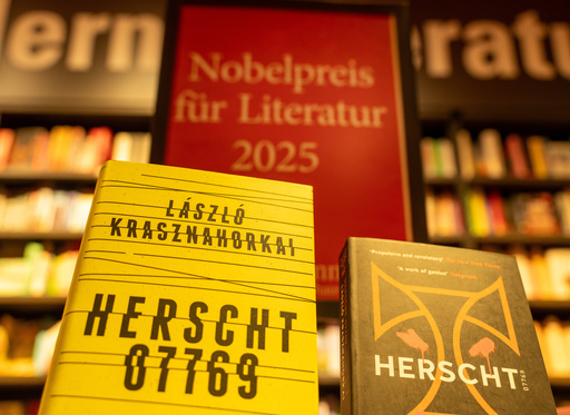 Books by Hungarian writer Laszlo Krasznahorkai are displayed in front of a stand with the inscription "Nobel Prize for Literature 2025" in Berlin's Dussmann cultural department store in Berlin, Germany, Thursday, Oct. 9, 2025. (Soeren Stache/dpa via AP) Books by Hungarian writer Laszlo Krasznahorkai are displayed in front of a stand with the inscription "Nobel Prize for Literature 2025" in Berlin's Dussmann cultural department store in Berlin, Germany, Thursday, Oct. 9, 2025. (Soeren Stache/dpa via AP)
