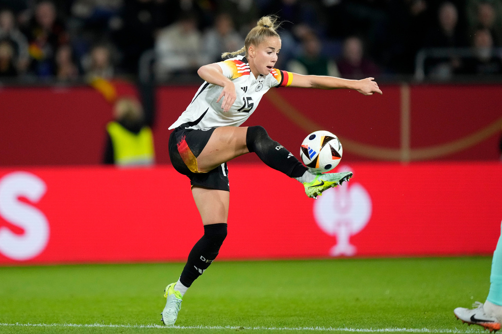 FILE - Germany's Giulia Gwinn challenges for the ball during the international women's friendly soccer match between Germany and Australia in Duisburg, Germany, Monday, Oct. 28, 2024. (AP Photo/Martin Meissner, File)