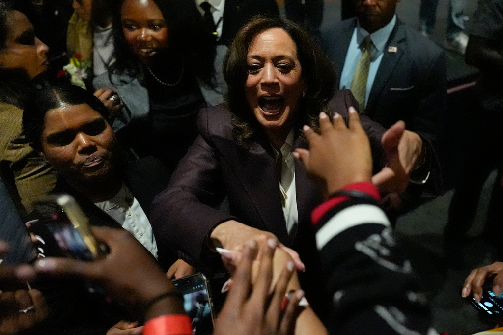 Former Vice President Kamala Harris shakes hands on the rope line during a campaign event on the campus of Clark Atlanta University, Thursday, Oct. 29, 2026, in Atlanta. (AP Photo/Mike Stewart)