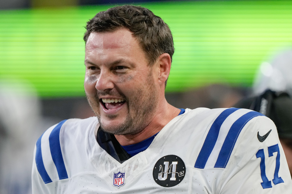 Indianapolis Colts quarterback Philip Rivers reacts during the second half of an NFL football game against the Seattle Seahawks, Sunday, Dec. 14, 2025, in Seattle. (AP Photo/Stephen Brashear)
