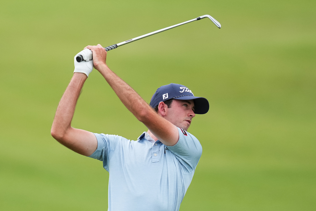 Elvis Smylie plays an approach shot on the ninth Hole during the first round of the Australian Open golf tournament in Melbourne, Australia, Thursday, Dec. 4, 2025. (AP Photo/Asanka Brendon Ratnayake)