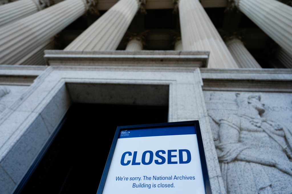 A closed sign stands in front of the National Archives on the first day of a government shutdown, Wednesday, Oct. 1, 2025, in Washington. (AP Photo/Julia Demaree Nikhinson)