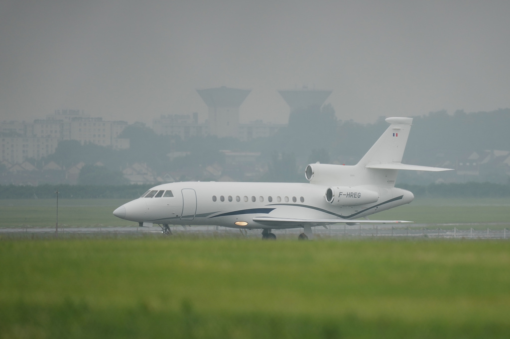 A plane carrying patients evacuated from the MV Hondius cruise ship with suspected hantavirus infection, lands at the Bourget airport, north of Paris, Sunday, May 10, 2026. (AP Photo/Thibault Camus)