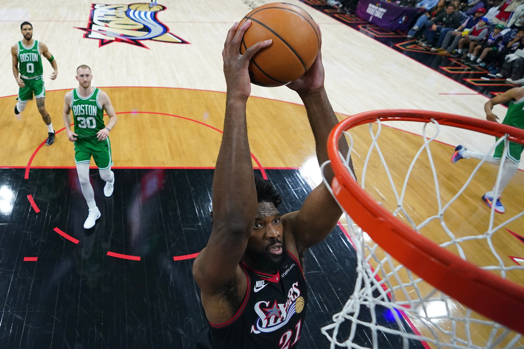 Philadelphia 76ers' Joel Embiid goes up for a dunk during the first half of Game 4 against the Boston Celtics in a first-round NBA basketball playoffs series Sunday, April 26, 2026, in Philadelphia. (AP Photo/Matt Slocum)