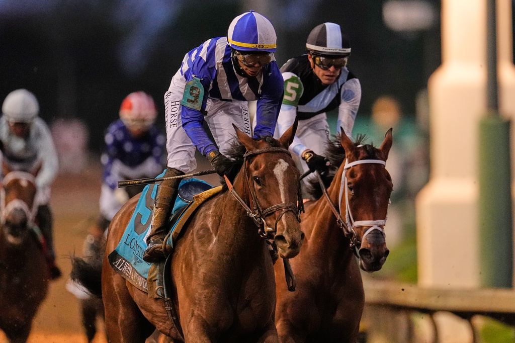 Always a Runner (9) ridden by Jose L. Ortiz wins the 152nd running of the Kentucky Oaks horse race at Churchill Downs, Friday, May 1, 2026, in Louisville, Ky. (AP Photo/George Walker IV)