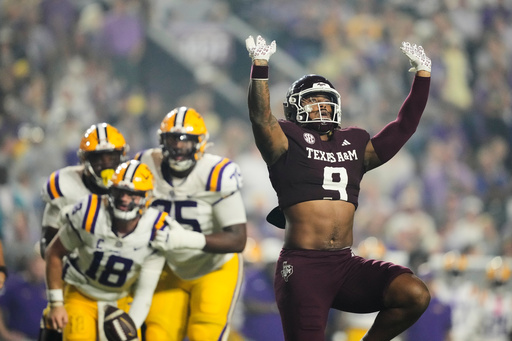 Texas A&M defensive end Cashius Howell (9) celebrates his sack of LSU quarterback Garrett Nussmeier (18) in the first half of an NCAA college football game, Saturday, Oct. 25, 2025 in Baton Rouge, La. (AP Photo/Gerald Herbert) Texas A&M defensive end Cashius Howell (9) celebrates his sack of LSU quarterback Garrett Nussmeier (18) in the first half of an NCAA college football game, Saturday, Oct. 25, 2025 in Baton Rouge, La. (AP Photo/Gerald Herbert)