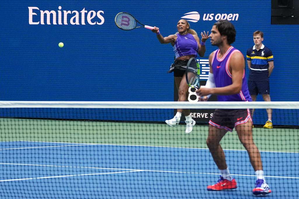 Serena Williams, of the United States, hits the ball during a mixed doubles match at the U.S. Open tennis championships, Tuesday, Aug. 25, 2026, in New York. (AP Photo/Sydney Schaefer)