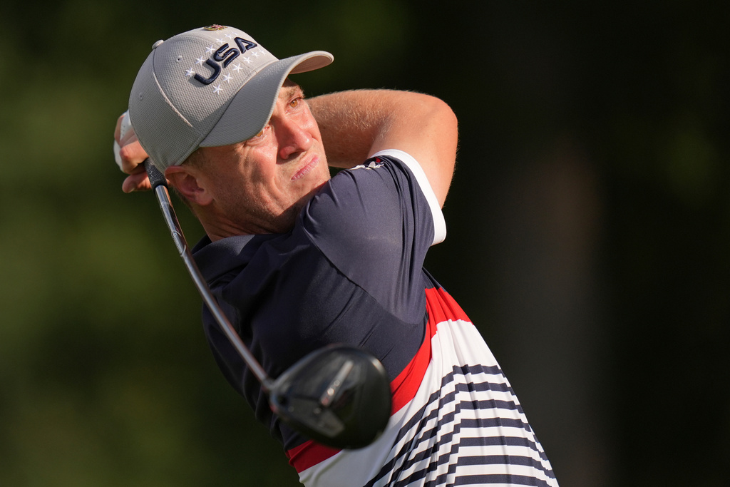 FILE - United States' Justin Thomas watches his tee shot on the 12th hole at Bethpage Black golf course during the Ryder Cup golf tournament, Friday, Sept. 26, 2025, in Farmingdale, N.Y. (AP Photo/Seth Wenig, File)