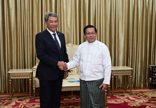 In this image provided by the Myanmar Military True News Information Team, Myanmar military leader Senior Gen. Min Aung Hlaing, right, shakes hands with Malaysian Foreign Minister Mohamad Hasan, left, during their meeting at the military guest house in Naypyitaw, Myanmar, Thursday, Oct. 9, 2025. (The Myanmar Military True News Information Team via AP) In this image provided by the Myanmar Military True News Information Team, Myanmar military leader Senior Gen. Min Aung Hlaing, right, shakes hands with Malaysian Foreign Minister Mohamad Hasan, left, during their meeting at the military guest house in Naypyitaw, Myanmar, Thursday, Oct. 9, 2025. (The Myanmar Military True News Information Team via AP)
