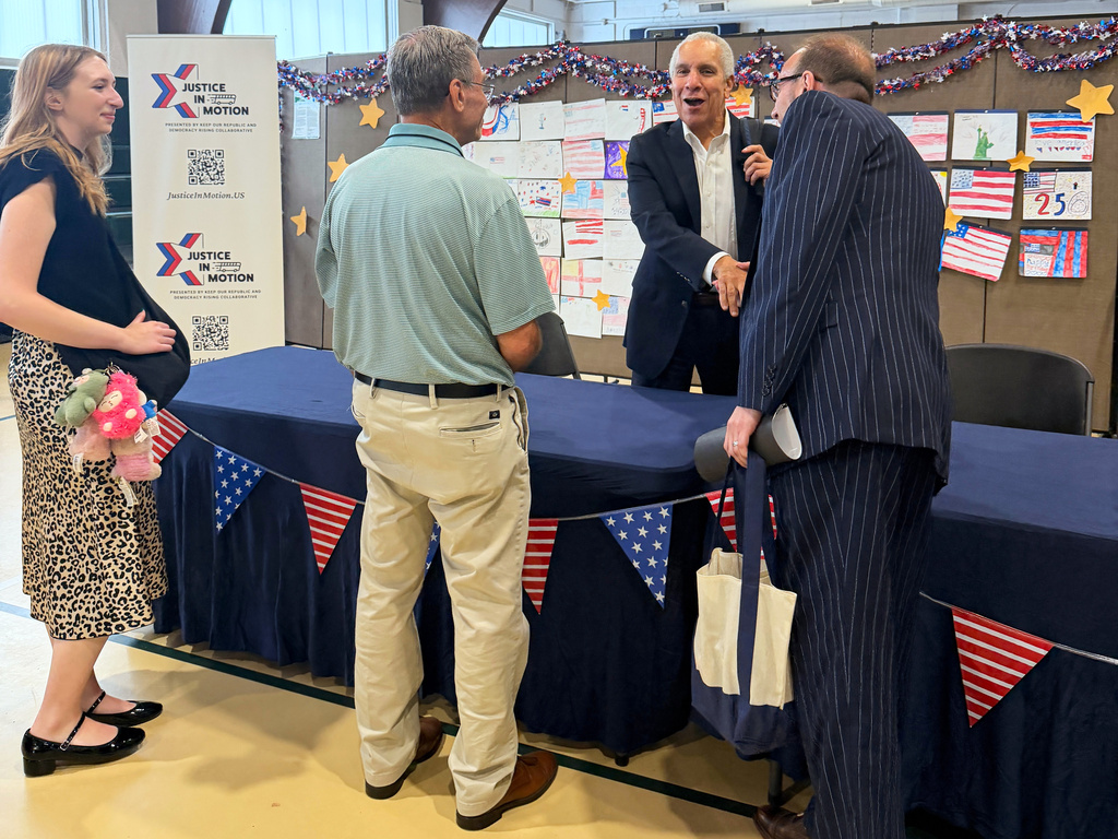Timothy Lewis, a former federal appeals court judge, talks to visitors at the LeMoyne Community Center in Washington, Pa., on Tuesday, July 7, 2026. (Keep Our Republic via AP)
