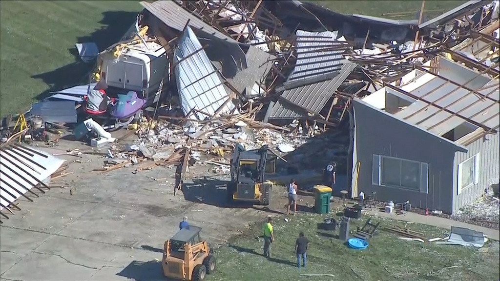 This photo made from video provided by WLS shows an aerial view of storm damage and a tornado-ravaged area on Friday, June 12, 2026, in Merrillville, Ind. (WLS via AP)