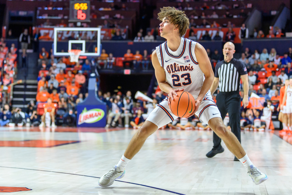 Illinois guard Keaton Wagler looks to pass during the first half of an NCAA college basketball game against Maryland Wednesday, Jan. 21, 2026, in Champaign, Ill. (AP Photo/Craig Pessman)