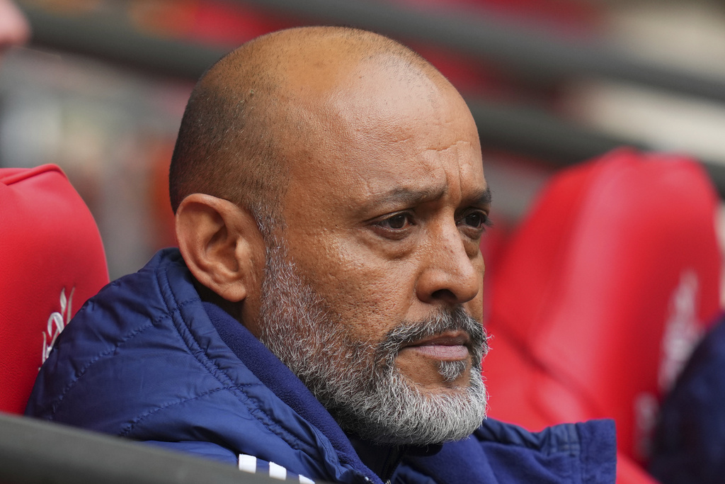 FILE =Nottingham Forest's head coach Nuno Espirito Santo sits before the English FA Cup semifinal soccer match between Nottingham Forest and Manchester City at Wembley stadium in London, Sunday, April 27, 2025. (AP Photo/Kirsty Wigglesworth,File)