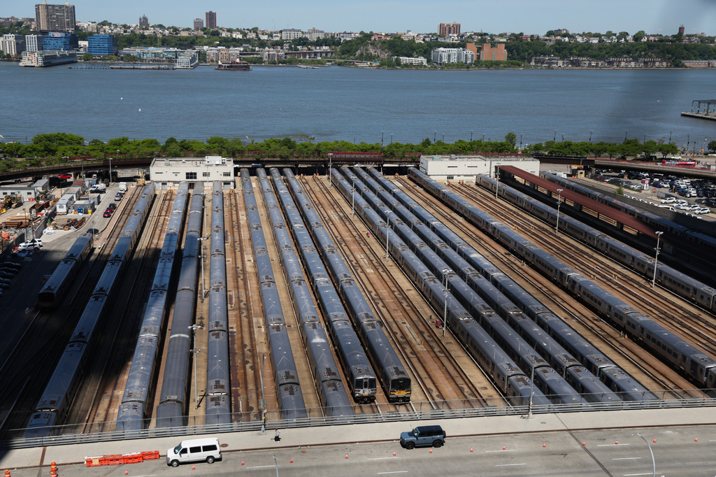 Long Island Rail Road trains sit at the West Side Yard on the first day of a Long Island Rail Road workers' strike, Saturday, May 16, 2026, in New York. (AP Photo/Heather Khalifa)