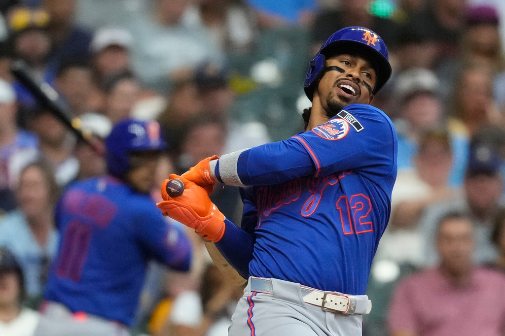 New York Mets' Francisco Lindor strikes out during the sixth inning of a baseball game against the Milwaukee Brewers, Monday, July 20, 2026, in Milwaukee. (AP Photo/Aaron Gash)