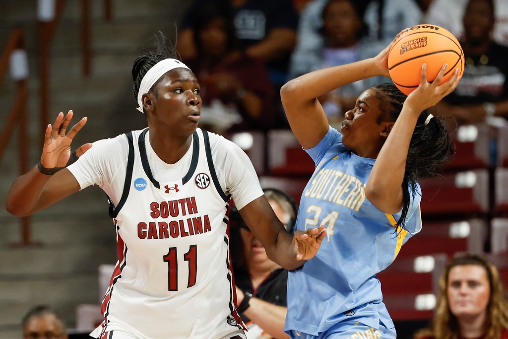 Southern forward DeMya Porter (24) looks to shoot against South Carolina center Madina Okot during the first half of the first round of the NCAA college basketball tournament, Saturday, March 21, 2026, in Columbia, S.C. (AP Photo/Nell Redmond)