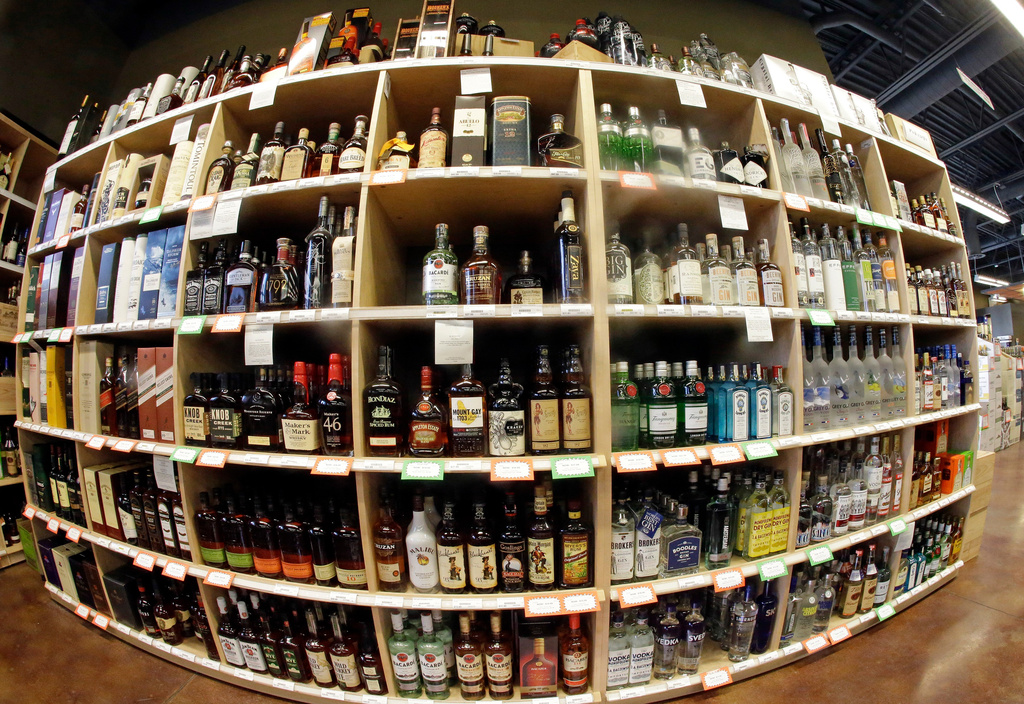 FILE - Bottles of alcohol during a tour of a state liquor store, in Salt Lake City, June 16, 2016. (AP Photo/Rick Bowmer, File)