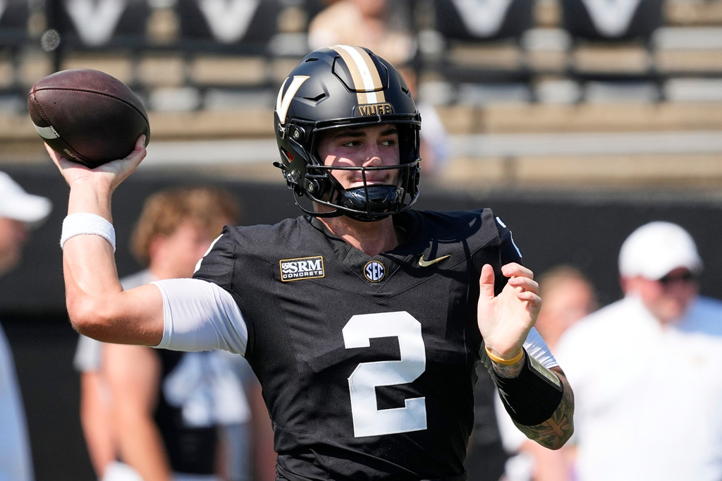 Vanderbilt quarterback Jared Curtis (2) warms up before an NCAA college football game against North Carolina State, Saturday, Sept. 19, 2026, in Nashville, Tenn. (AP Photo/George Walker IV)
