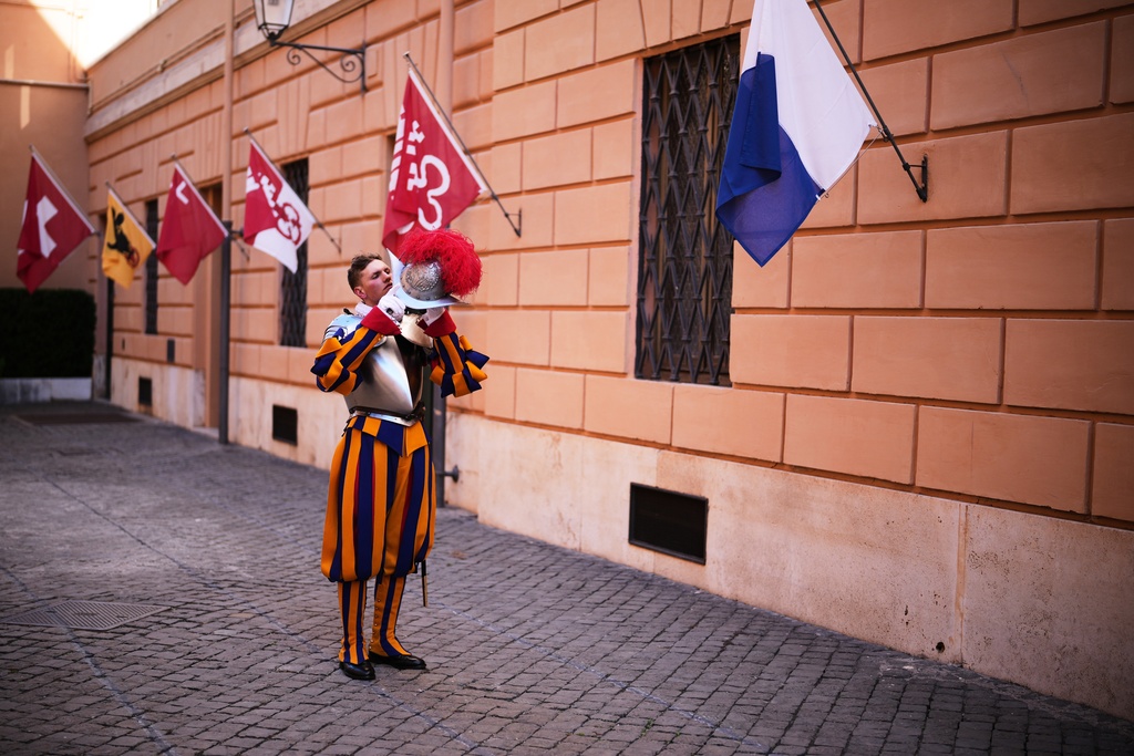 Pontifical Swiss Guards prepare ahead of their swearing in ceremony, at the Vatican, Saturday, Oct. 4, 2025. (AP Photo/Andrew Medichini)