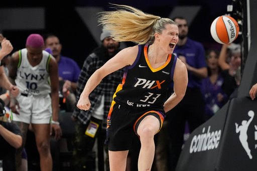 Phoenix Mercury guard Sami Whitcomb (33) celebrates her score against Minnesota Lynx guard Courtney Williams (10) during the first half of Game 3 of a WNBA basketball playoff semifinals series game Friday, Sept. 26, 2025, in Phoenix. (AP Photo/Ross D. Franklin) Phoenix Mercury guard Sami Whitcomb (33) celebrates her score against Minnesota Lynx guard Courtney Williams (10) during the first half of Game 3 of a WNBA basketball playoff semifinals series game Friday, Sept. 26, 2025, in Phoenix. (AP Photo/Ross D. Franklin)