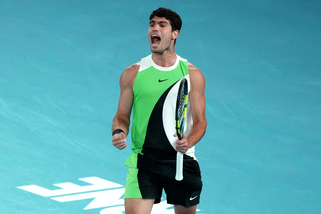 Carlos Alcaraz of Spain reacts during the men's singles final match against Novak Djokovic of Serbia at the Australian Open tennis championship in Melbourne, Australia, Sunday, Feb. 1, 2026.(AP Photo/Mark Baker)