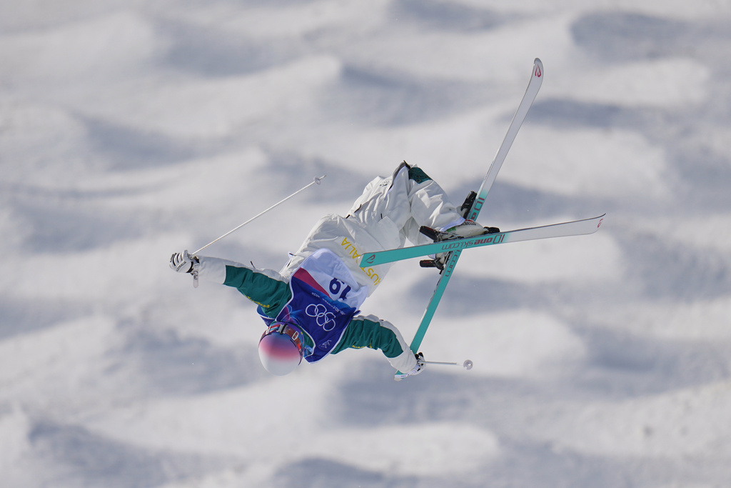 Australia's Cooper Woods competes during the men's freestyle skiing moguls finals at the 2026 Winter Olympics, in Livigno, Italy, Thursday, Feb. 12, 2026. (AP Photo/Gregory Bull)