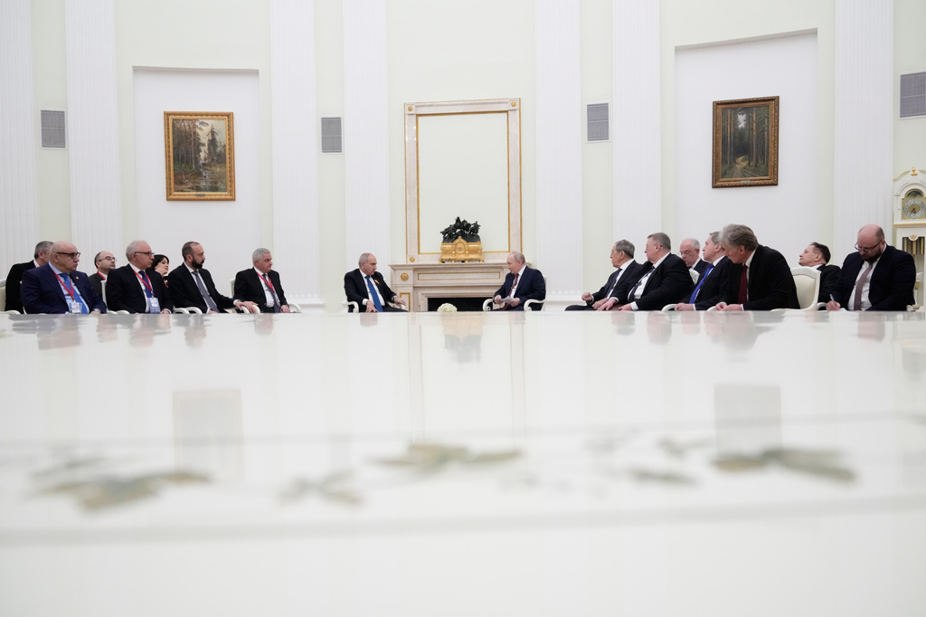 Russian President Vladimir Putin, center right, and Armenian Prime Minister Nikol Pashinyan, center left, hold talks at the Kremlin in Moscow, Wednesday, April 1, 2026. (AP Photo/Pavel Bednyakov, Pool)