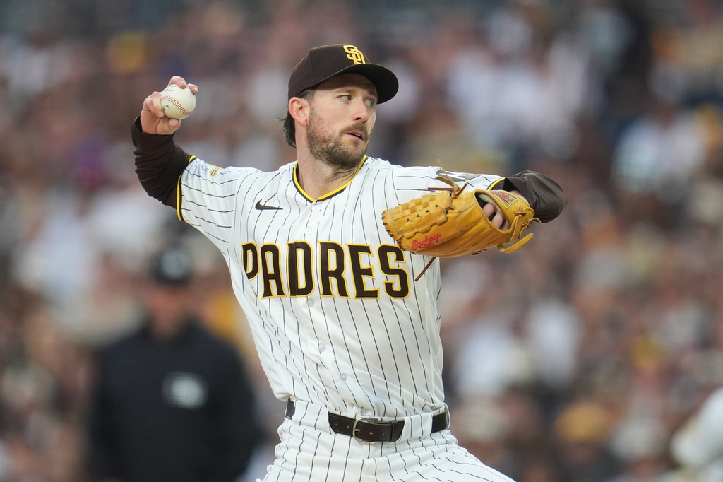 San Diego Padres starting pitcher Griffin Canning works against a Los Angeles Dodgers batter during the third inning of a baseball game Tuesday, May 19, 2026, in San Diego. (AP Photo/Gregory Bull)