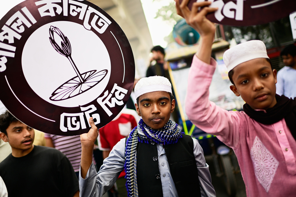 Supporters of Bangladesh's National Citizen Party hold a campaign rally ahead of next month's national elections in Dhaka, Bangladesh, Thursday, Jan. 22, 2026. (AP Photo/Mahmud Hossain Opu)