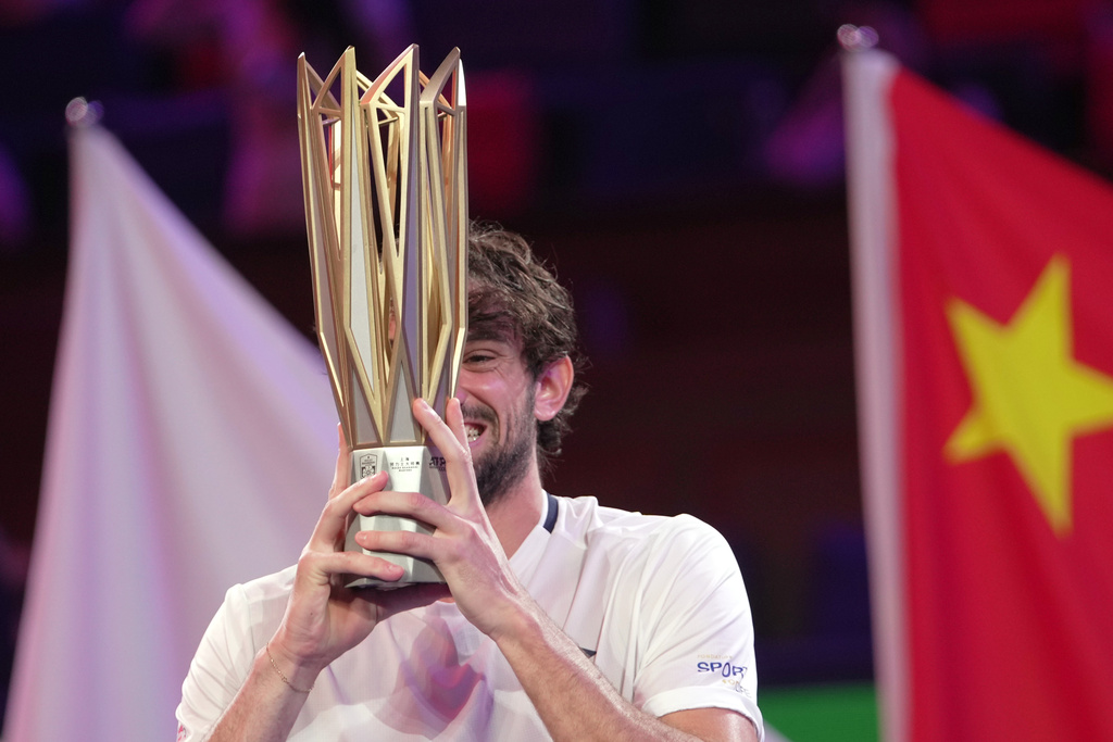 Valentin Vacherot of Monaco celebrates with the trophy after winning the final of the Shanghai Masters tennis tournament defeating Arthur Rinderknech of France at Qizhong Forest Sports City Tennis Center, in Shanghai, China, Sunday, Oct. 12, 2025. (AP Photo/Andy Wong)