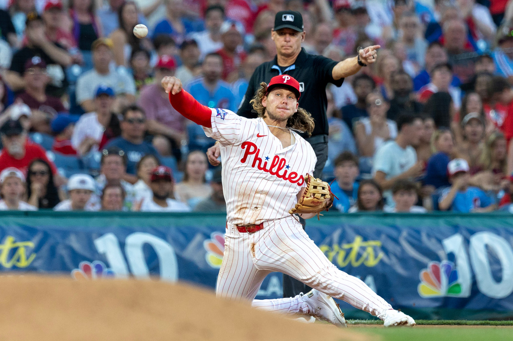Philadelphia Phillies third baseman Alec Bohm throws to first for the out on Pittsburgh Pirates' Konnor Griffin during the fifth inning of a baseball game, Tuesday, June 30, 2026, in Philadelphia. (AP Photo/Laurence Kesterson)