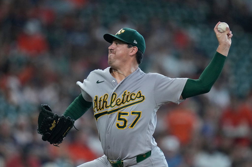 Athletics pitcher Jacob Lopez delivers during the first inning of a baseball game against the Houston Astros, Saturday, Aug. 22, 2026, in Houston. (AP Photo/Kevin M. Cox)