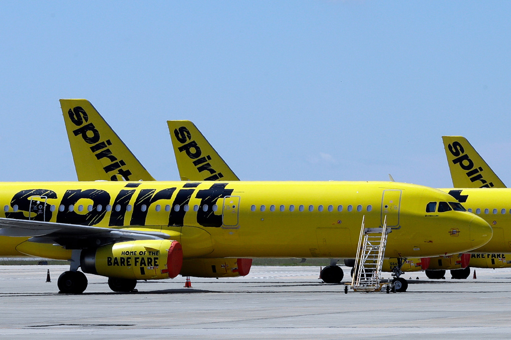 FLE - A line of Spirit Airlines jets sit on the tarmac at the Orlando International Airport on May 20, 2020, in Orlando, Fla. (AP Photo/Chris O'Meara, File)
