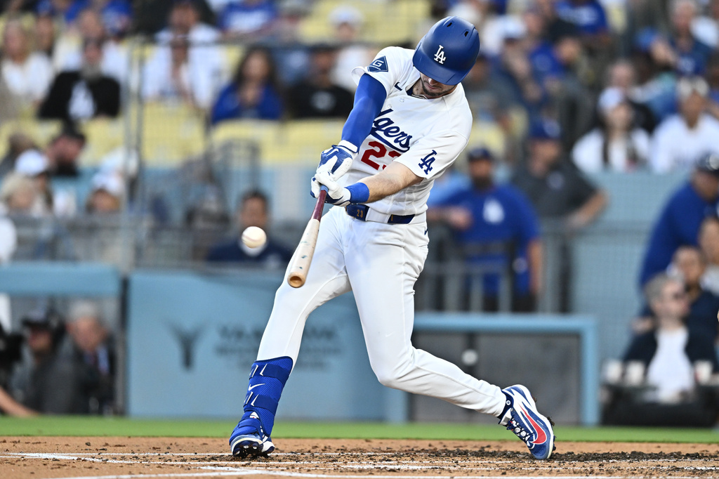 Los Angeles Dodgers' Kyle Tucker hits a three-run home run during the second inning of a baseball game against the Tampa Bay Rays, Monday, June 15, 2026, in Los Angeles. (AP Photo/William Liang)