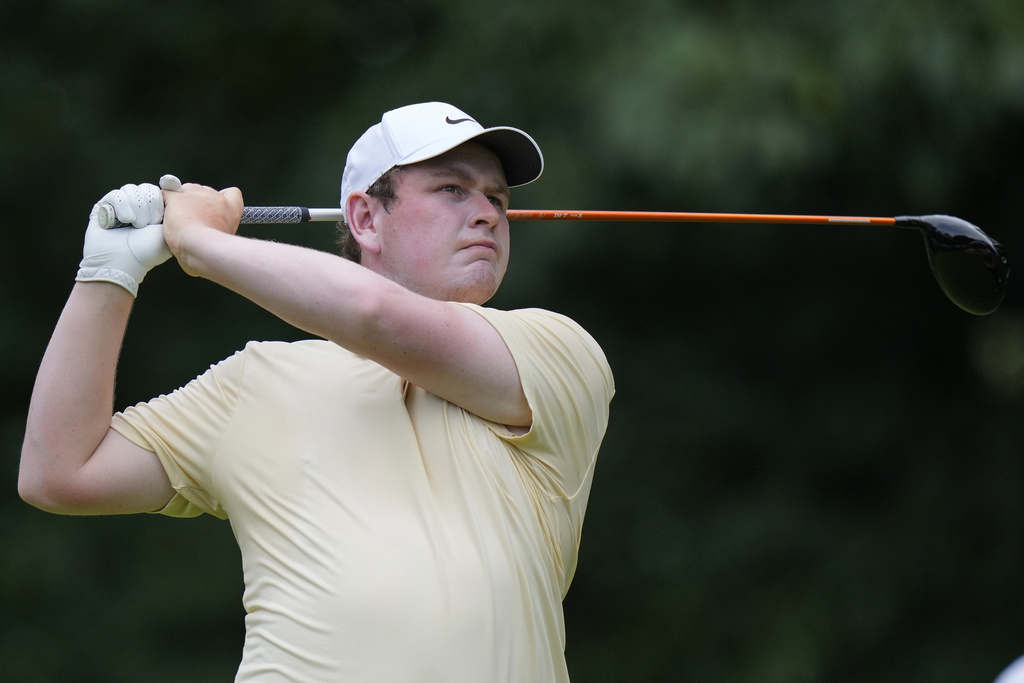Robert MacIntyre, of Scotland, hits from the fifth tee during the third round of the BMW Championship golf tournament Saturday, Aug. 16, 2025, in Owings Mills, Md. (AP Photo/Stephanie Scarbrough)