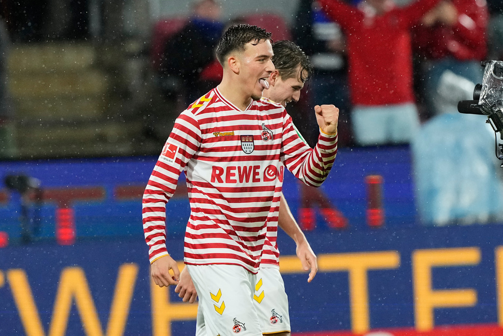 Cologne's Said El Mala celebrates after scoring his side's third goal during the German Bundesliga soccer match between Cologne and Hamburger SV, in Cologne, Germany, Sunday, Nov. 2, 2025. (AP Photo/Martin Meissner)