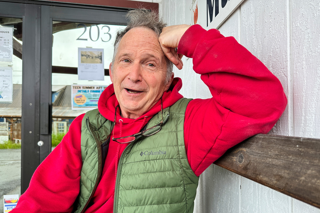 FILE - Dan Sullivan, a candidate in Alaska's U.S. Senate race who shares his name with the incumbent seeking reelection, talks with a reporter, July 3, 2026, in Petersburg, Alaska. (AP Photo/Becky Bohrer, File)