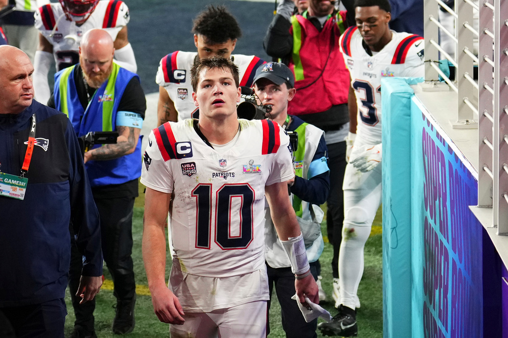 New England Patriots quarterback Drake Maye (10) and teammates walk off the field after losing to the Seattle Seahawks in the NFL Super Bowl 60 football game, Sunday, Feb. 8, 2026, in Santa Clara, Calif. (AP Photo/Godofredo A. V&aacute;squez)