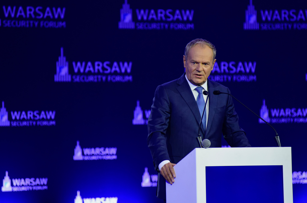 Polish Prime Minister Donald Tusk speaks at the Warsaw Security Forum in Warsaw, Poland, Monday, Oct. 12, 2026. (AP Photo/Attila Husejnow)