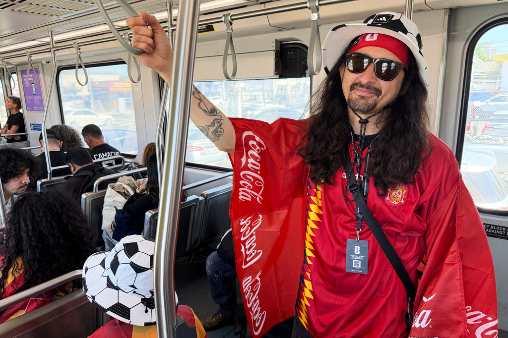 Dave Ramazzini rides the Metro after a World Cup match between Spain and Austria on Thursday, July 2, 2026, in Los Angeles. (AP Photo/Jaimie Ding)