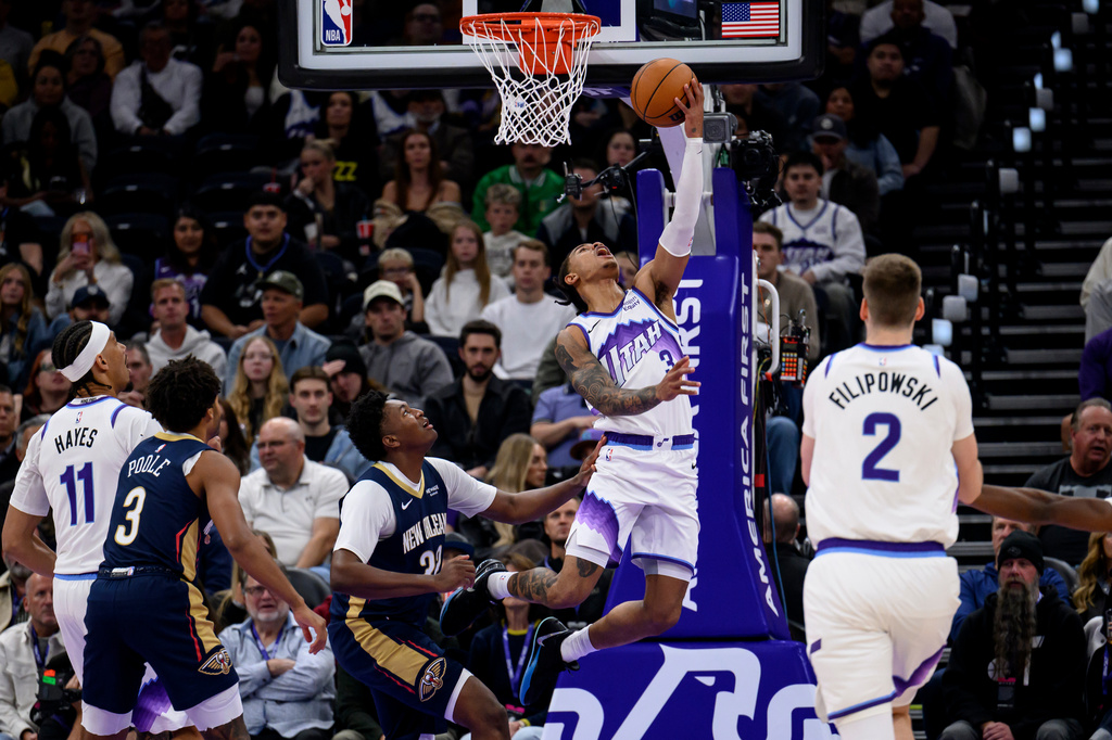 Utah Jazz guard Keyonte George (3) goes to the basket for a layup during an NBA basketball game against the New Orleans Pelicans, Friday, Oct. 23, 2026, in Salt Lake City. (AP Photo/Tyler Tate)