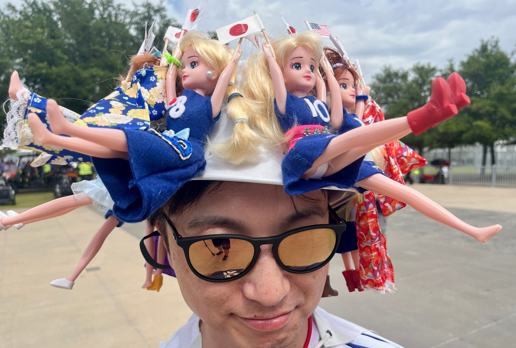Japan fan Hiroaki Nakazawa poses before the team's World Cup match against Sweden in Arlington, Texas, Thursday, June 25, 2026. (AP Photo/Thomas Peipert)