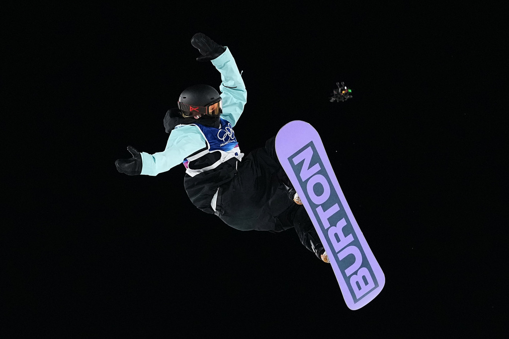 Austria's Hanna Karrer competes during the women's snowboarding big air finals at the 2026 Winter Olympics, in Livigno, Italy, Monday, Feb. 9, 2026. (AP Photo/Lindsey Wasson)