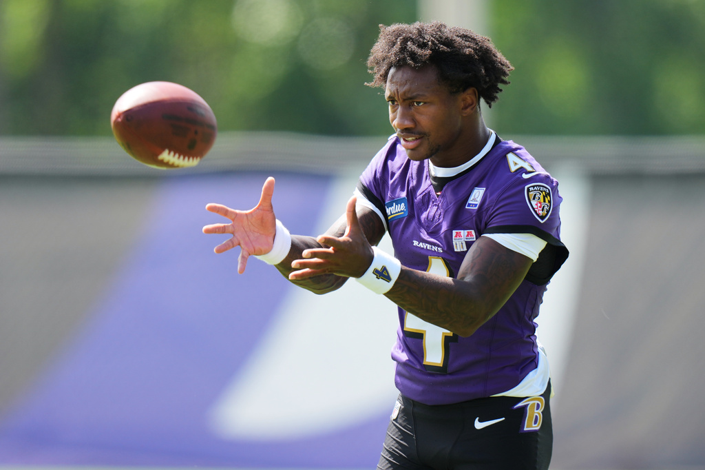 Baltimore Ravens wide receiver Zay Flowers (4) works out during practice at the team's NFL football training camp, Wednesday, July 29, 2026, at the Under Armour Performance Center in Owings Mills, Md. (AP Photo/Stephanie Scarbrough)