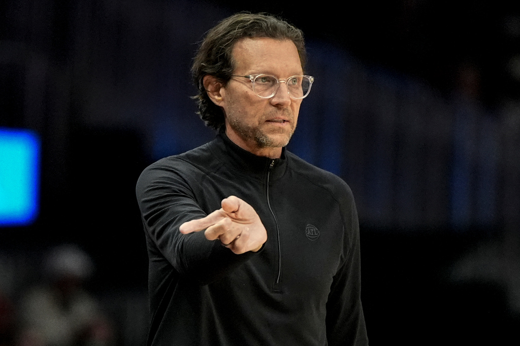 Atlanta Hawks head coach Quin Snyder speaks in the first half of an NBA basketball game against the Boston Celtics, Monday, March 30, 2026, in Atlanta. (AP Photo/Mike Stewart)