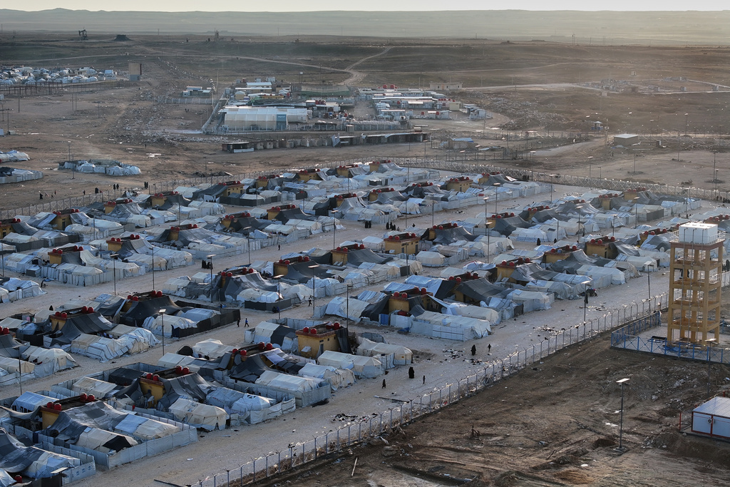 An aerial view shows the al-Hol camp in northeastern Syria's Hasakeh province, Syria, Wednesday, Jan. 21, 2026, after the withdrawal of the Syrian Democratic Forces (SDF). (AP Photo/Ghaith Alsayed)